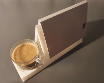 Practical and Multifunctional: Plastic Book Holder for an Enjoyable Reading Experience Alongside a Convenient Drink Holder!