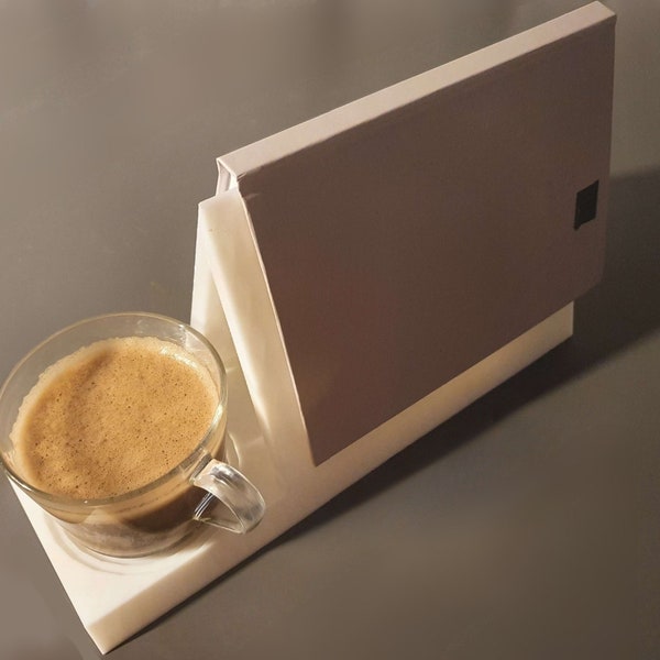 Practical and Multifunctional: Plastic Book Holder for an Enjoyable Reading Experience Alongside a Convenient Drink Holder!