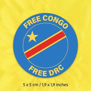 May include: A blue and yellow circle sticker with the text "FREE CONGO FREE DRC" and a yellow star on a blue background with a red diagonal stripe. The sticker is 5 x 5 cm / 1.9 x 1.9 inches.