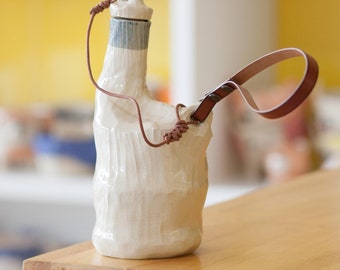 Handcrafted Ceramic Bottle with Cork and Leather Strap,Ceramic bottle,Leather strap bottle,Unique home décor,Artisanal design,Handmade gift