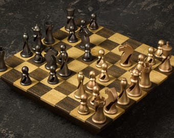 Chess set &quot;ADAM&quot; with cast bronze figures. Hollow design for ideal weight and playability. Extra queen.
