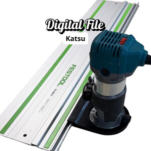 May include: A teal and silver power router with a black base, next to a silver guide rail with green stripes. The guide rail has the text "FESTOOL" and "FS 800/2". The image also includes the text "Digital File" and "Katsu".