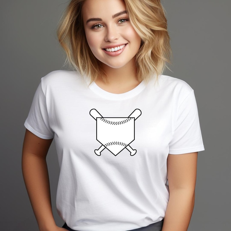 May include: White t-shirt with a black baseball home plate and crossed bats graphic.