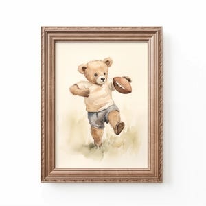 Vintage watercolor illustration art print of a teddy bear playing football. Football theme nursery art. Sports nursery decor. Nursery inspiration. Nursery ideas. Vintage nursery art. Kids room sports art. Football kids room art. Playroom football.