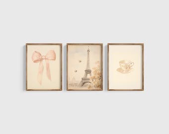 Può includere: Set di tre stampe ad acquerello incorniciate che raffigurano un fiocco rosa, la Torre Eiffel e una tazza da tè. Le stampe hanno un'estetica vintage e sono perfette per un arredamento di casa a tema parigino.