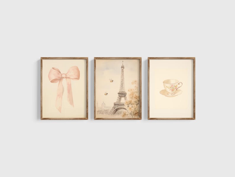 Vintage watercolor illustration art print of a bow, Eiffel Tower, and a tea cup. Coquette nursery decor. Bow art for nursery. French nursery art. Nursery inspiration. Nursery ideas. Vintage nursery art. Baby girl bow art. Paris kids room art.