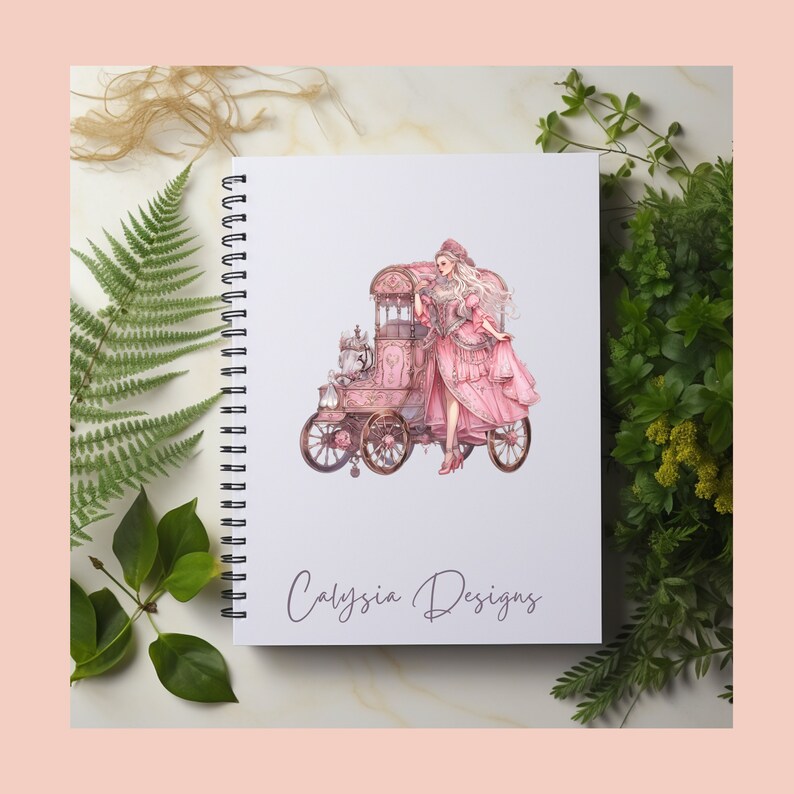 May include: A pink and white notebook with a spiral binding. The cover features a digital illustration of a woman in a pink dress riding in a vintage car. The text "Calyssa Designs" is printed on the bottom of the cover.