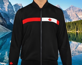 May include: Black bomber jacket with a red and white stripe across the chest, featuring a Canadian maple leaf emblem. The jacket has a full-length zipper and a maple leaf logo on the left sleeve.