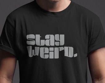 Camiseta gráfica Stay Weird: camiseta unisex de estilo suave