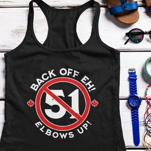 May include: Black tank top with a red circle and a white diagonal line through it. The circle has the number 51 in white and the text "Back Off Eh! Elbows Up!" in white.