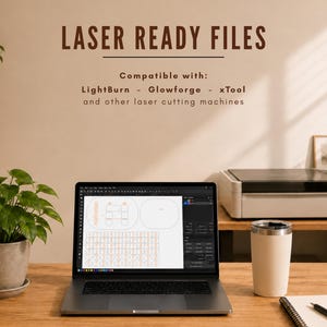 May include: A laptop displaying a design layout sits on a wooden desk, next to a white tumbler and a notebook with a pen. The text "LASER READY FILES" is at the top, with "Compatible with: LightBurn - Glowforge - xTool and other laser cutting machines" below.