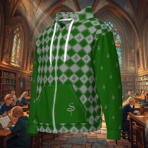 May include: Green and grey zip-up hoodie with a diamond pattern and a snake emblem. The hoodie has a white drawstring and a front pocket. The background shows a library with people reading.