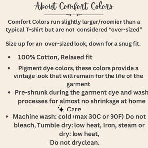 May include: Text on a cream-colored background reads "About Comfort Colors." Details include that Comfort Colors shirts run slightly larger, are 100% cotton, and have pigment dye colors for a vintage look. Care instructions are also provided.