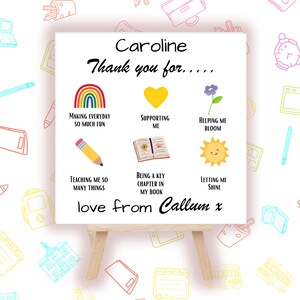 May include: A white canvas with a message that says "Caroline Thank you for..." with illustrations of a rainbow, a yellow heart, a purple flower, a pencil, a book, and a sun. The text below the illustrations says "love from Callum x".