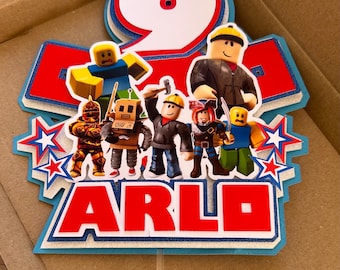 Level up your party with a personalized Roblox cake topper that every gamer will love!