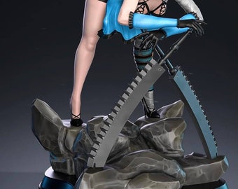 May include: A white haired figurine of a woman in a blue and white dress, holding two large, silver, serrated blades. The figurine is standing on a rocky base.