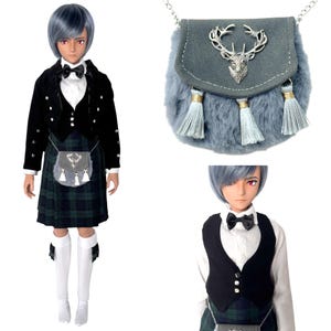 May include: A doll wearing a black jacket, bow tie, and a green plaid kilt. The doll has gray hair and is wearing white knee-high socks and black shoes. A gray fur pouch with a silver deer emblem hangs from the doll's waist.