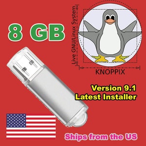Peut inclure: Une clé USB argentée avec un logo de pingouin et le texte "Live GNU/Linux System, KNOPPIX Version 9.1 Latest Installer" sur un fond rouge.