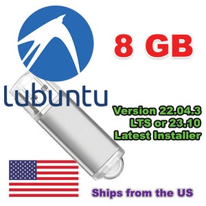 May include: A silver USB flash drive featuring the Lubuntu logo, a blue and white design, and the text "8 GB". The text "Version 22.04.3 LTS or 23.10 Latest Installer" is also visible.
