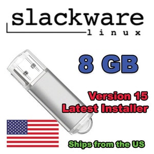 May include: A silver 8 GB USB flash drive with the text "Slackware Linux Version 15 Latest Installer." The American flag is in the lower left corner.