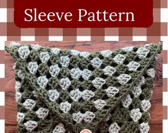 May include: A rectangular crochet book sleeve featuring a granny square pattern in alternating olive green and light gray yarn. The envelope-style flap is secured with a single light pink button centered at the bottom edge of the flap.