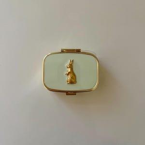 Brass bunny rabbit pill box:  mint green resin two compartment case