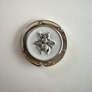 Bee Bag Hook: Silver Foldable Purse Hanger with Bee on White Resin
