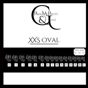 XXS nail tips in oval shape that includes measurements