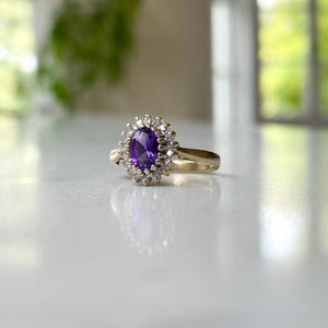 Vintage amethyst and diamond halo ring on 9ct gold