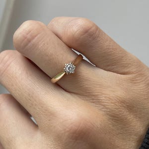 Vintage illusion set diamond solitaire ring on 9ct gold