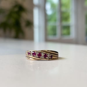 Vintage Ruby and diamond crossover band ring on 9ct gold