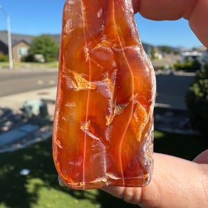 Carnelian Agate with Fortification Lines. Self Collected and Tumbled from Southern Oregon.