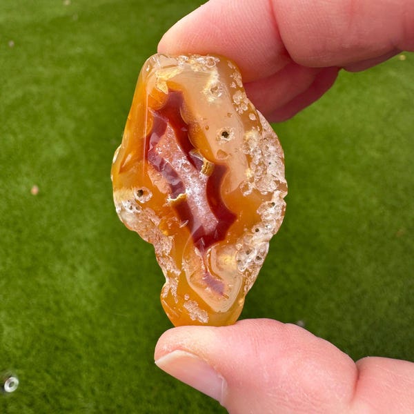 Carnelian crystal agate with druzy center and red fortification lines on top, Large crystal center. Cut to stand. From Sweet Home, Oregon.
