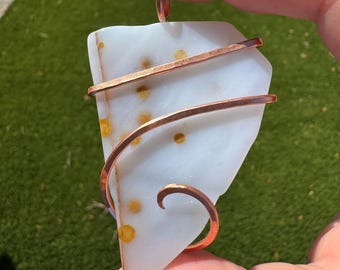 Polka Dot Agate pendant in custom hammered copper wrap. Collected, cut, and tumbled from Madras, Oregon