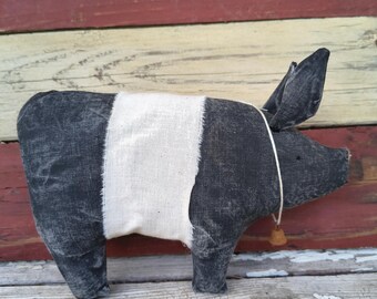 Cerdo primitivo hecho a mano para colocar en estantes
