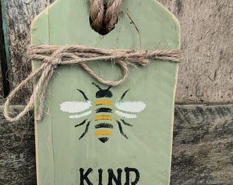 Etiqueta de puerta hecha a mano con forma de abeja