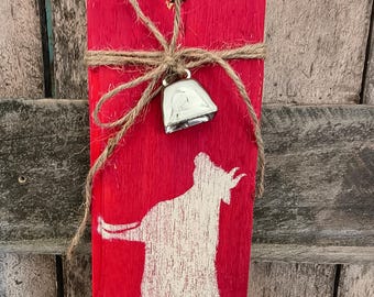 Etiqueta de puerta de vaca primitiva hecha a mano