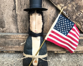 Adorno de estantería hecho a mano con la imagen de Abraham Lincoln
