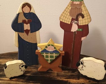 Nacimiento primitivo de madera pintado a mano