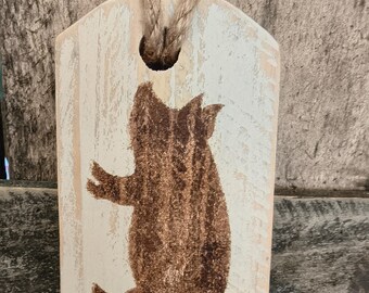Etiqueta de puerta de cerdo pintada a mano