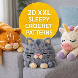 May include: Three crocheted plush toys: an orange tabby cat, a gray cat, and a unicorn with a yellow horn and colorful mane. A yellow circle in the background reads "20 XXL SLEEPY CROCHET PATTERNS". The toys are resting on a gray surface.