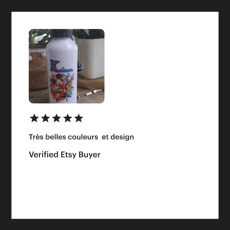May include: A white water bottle with a colorful design featuring a cartoon character. The bottle has the name "Raina" printed on it.