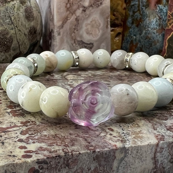 Single strand Caribbean calcite beaded crystal bracelet with flourite carved flower focal.