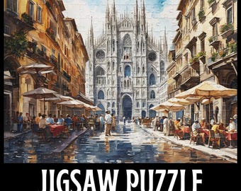 May include: A jigsaw puzzle featuring a watercolor painting of a European city street scene with a large cathedral in the background. The image includes people dining at outdoor cafes. The text "JIGSAW PUZZLE" is at the bottom.