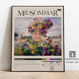 May include: A movie poster for the film "Midsommar" featuring a woman wearing a flower crown and a floral dress. The poster is in a vintage style with a black frame and a white background. The text on the poster reads "Midsommar" and "2019".