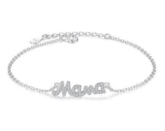 May include: A silver bracelet with a delicate chain and a charm that says "Mama" in sparkly silver lettering.