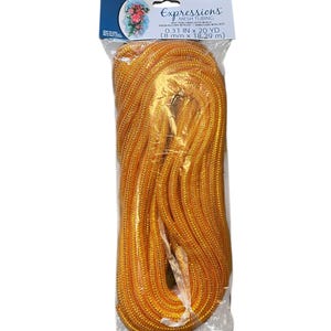 May include: A package of gold mesh tubing, labeled "Expressions" by Darice. The package contains 0.31 in x 20 yd (8 mm x 18.29 m) of metallic mesh tubing. The tubing is a bright, shiny gold color and is tightly coiled within the clear plastic packaging.
