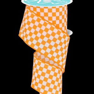 May include: A roll of 2.5 inch wide orange and white checkered ribbon. The ribbon is made of a soft, durable fabric and is perfect for adding a touch of color and pattern to your crafts and decorations.