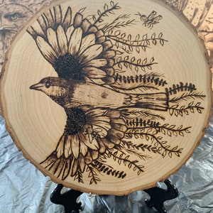 Small bird and flowers pyrography