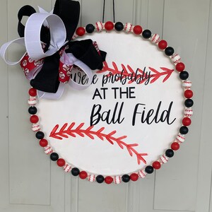Ball field door hanger